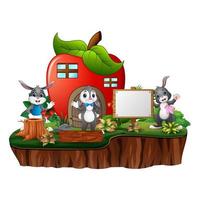 rotes Apfelhaus mit drei Kaninchen auf weißem Hintergrund vektor