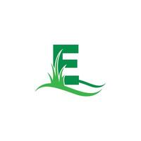 Buchstabe e hinter einem grünen Gras-Symbol-Logo-Design-Vektor vektor