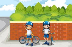 Två unga cyklister på gatan vektor