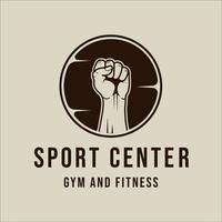 handfaust fitnessstudio logo vektor vintage illustration vorlage symbol grafikdesign. fitness- oder bodybuilding-zentrum zeichen oder symbol für sportgeschäft mit kreisabzeichen