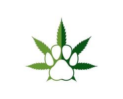 grünes Cannabisblatt mit Tierfingerabdruck im Inneren