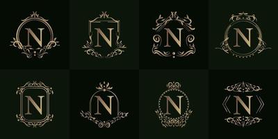 samling av logotyp initial n med lyxprydnad eller blomram vektor