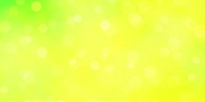 hellgrünes, gelbes Vektormuster mit Kreisen. vektor
