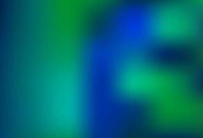 ljusblå, grön vektor suddigt ljust mönster.