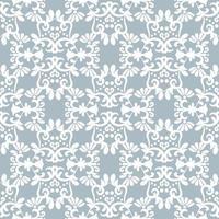 vit prydnad på ljusblå bakgrund. blommig damast seamless mönster. vektor vinter bakgrund. för tyg, tapeter eller förpackningar.
