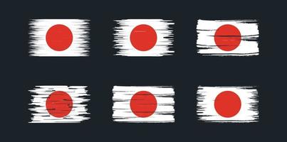 Pinselsammlung mit japanischer Flagge. Nationalflagge vektor