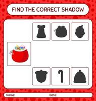 Finden Sie das richtige Schattenspiel mit der Tasche des Weihnachtsmanns. arbeitsblatt für vorschulkinder, kinderaktivitätsblatt vektor