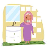 Ein Mädchen in einem Hijab putzt sich im Badezimmer die Zähne. Kinder sind hygienisch. vektor