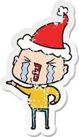 Distressed Sticker Cartoon eines weinenden kahlköpfigen Mannes mit Weihnachtsmütze vektor