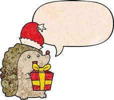 Cartoon-Igel mit Weihnachtsmütze und Sprechblase im Retro-Textur-Stil vektor