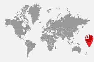 nålkarta med tongaflagga på världskartan. vektor illustration.