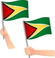 Symbol für Guyana-Flagge in der Hand vektor