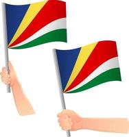 Seychellen-Flagge in der Hand-Symbol vektor