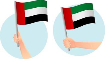 Symbol der Flagge der Vereinigten Arabischen Emirate in der Hand vektor