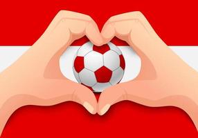Österrike fotboll och hand hjärta form vektor