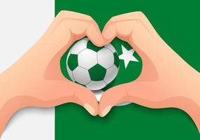 Pakistanischer Fußball und Handherzform vektor