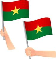 Burkina Faso-Flagge in der Hand-Symbol vektor