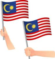 malaysia flagga i hand ikon vektor