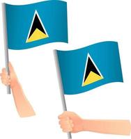 St. Lucia-Flagge in der Hand-Symbol vektor