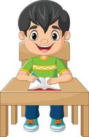 kleiner Junge der Karikatur, der auf dem Tisch studiert vektor