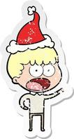 Distressed Sticker Cartoon eines schockierten Mannes mit Weihnachtsmütze vektor