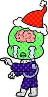 Comic-Stil-Illustration eines großen Gehirn-Aliens, der weint und mit Weihnachtsmütze zeigt vektor