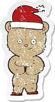 Retro beunruhigter Aufkleber eines Cartoon-Weihnachts-Teddybären vektor