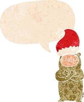 karikaturbär mit weihnachtsmütze und sprechblase im retro-strukturierten stil vektor