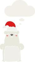 tecknad björn bär julhatt och tankebubbla i retrostil vektor