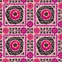 nahtloses muster der traditionellen asiatischen teppichstickerei suzanne in rosa und schwarzer farbe. usbekisches ethnisches dekoratives Blumenmotiv für Teppich, Stoff, Tischdecke vektor