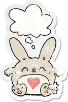 söt tecknad kanin med kärlekshjärta och tankebubbla som ett bekymrat slitet klistermärke vektor