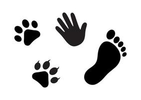 schwarz-weißer Katzenhund und menschliches Handabdruck- und Fußabdrucksymbol vektor