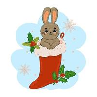 süßes kaninchen in einer weihnachtssocke. vektor