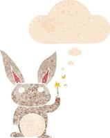 söt tecknad kanin och tankebubbla i retro texturerad stil vektor
