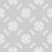 sömlös damast vitt mönster på grå bakgrund. moderna arabiska mönster. vektor mönster med prydnad. bakgrund, tapeter, omslag, textil mall.