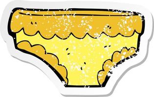 Retro-Distressed-Aufkleber einer Cartoon-Unterhose vektor