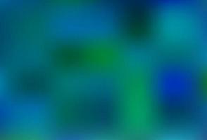 ljusblå, grön vektor abstrakt suddigt mönster.