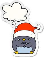 niedlicher Cartoon-Pinguin mit Weihnachtsmütze und Gedankenblase als bedruckter Aufkleber vektor