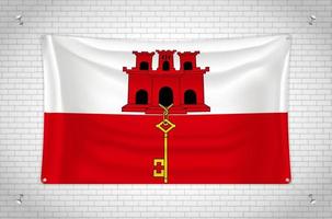 gibraltar-flagge, die an der mauer hängt. 3D-Zeichnung. Flagge an der Wand befestigt. Ordentliches Zeichnen in Gruppen auf separaten Ebenen für eine einfache Bearbeitung. vektor