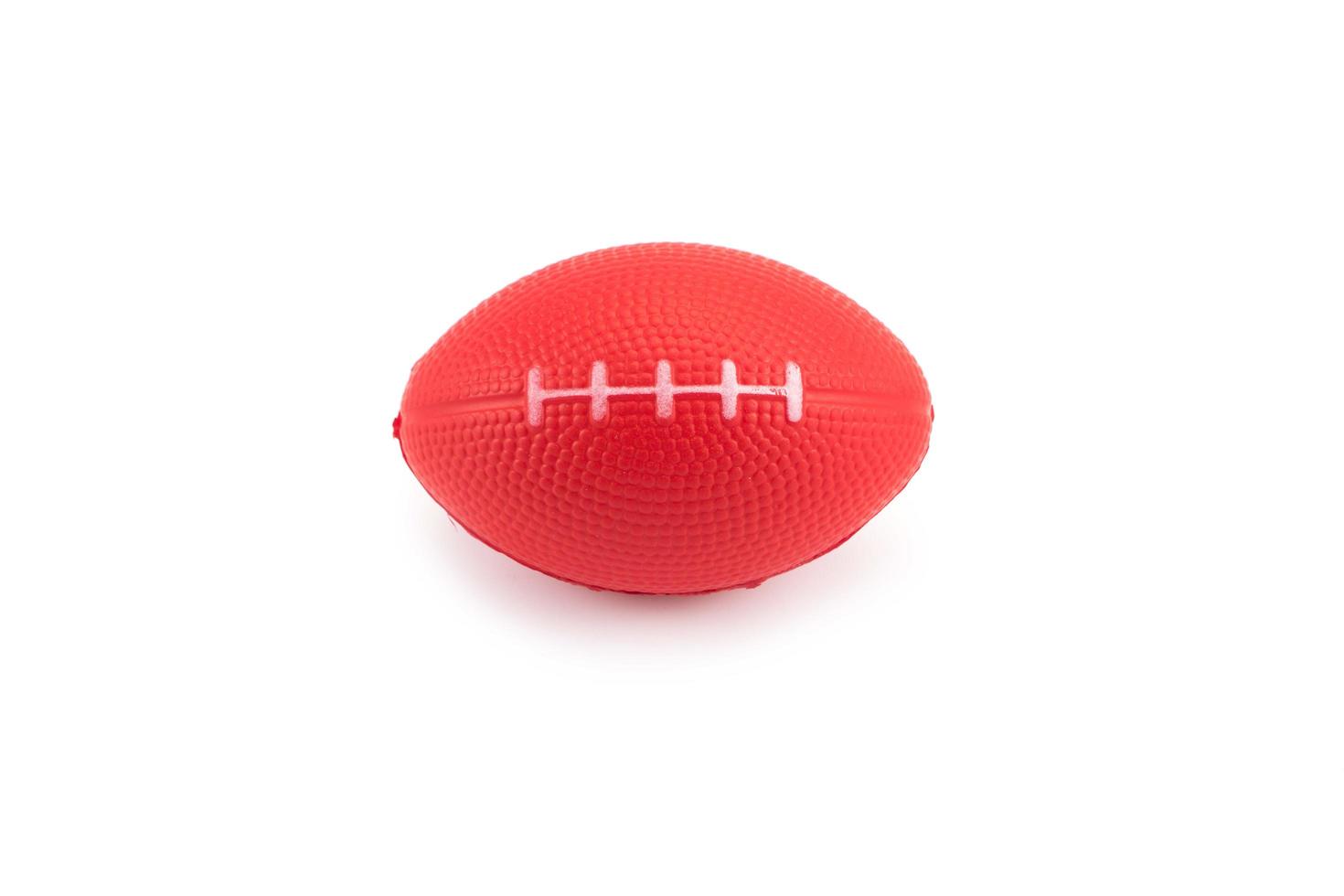 balle anti-stress, jouet de football américain sur fond blanc photo