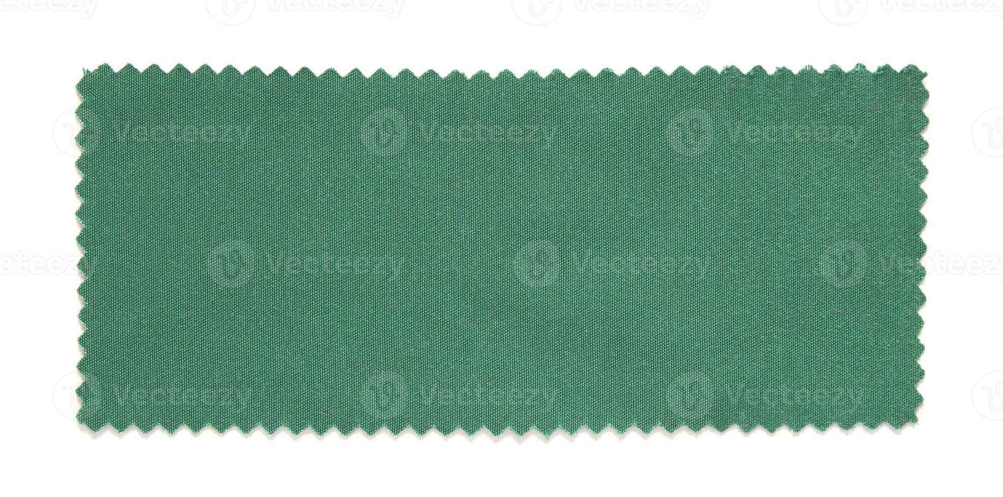 Échantillons de tissu vert isolés sur fond blanc photo