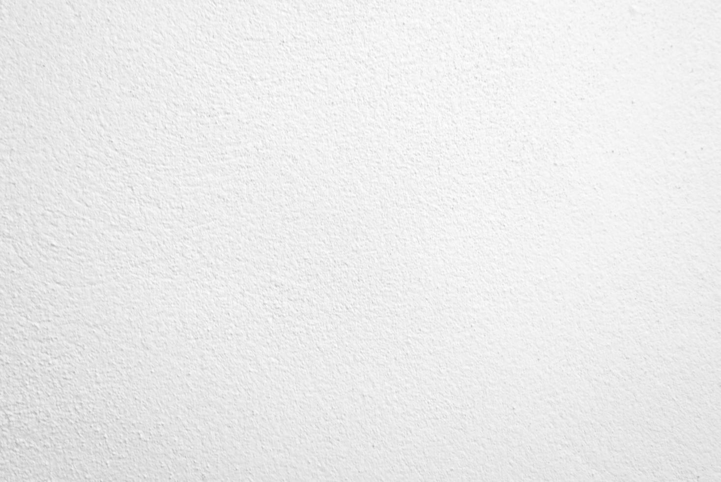 texture transparente du mur de ciment blanc une surface rugueuse, avec un espace pour le texte, pour un arrière-plan. photo