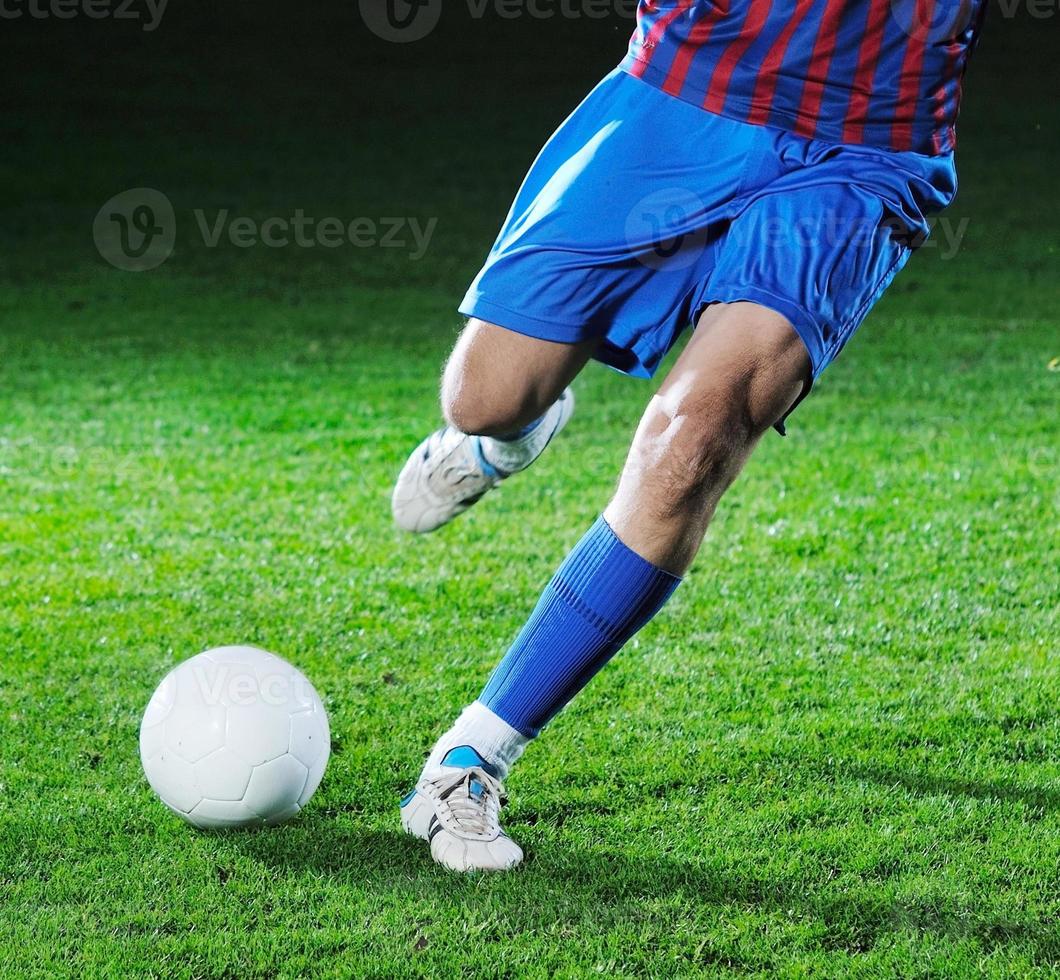 joueur de football en action photo