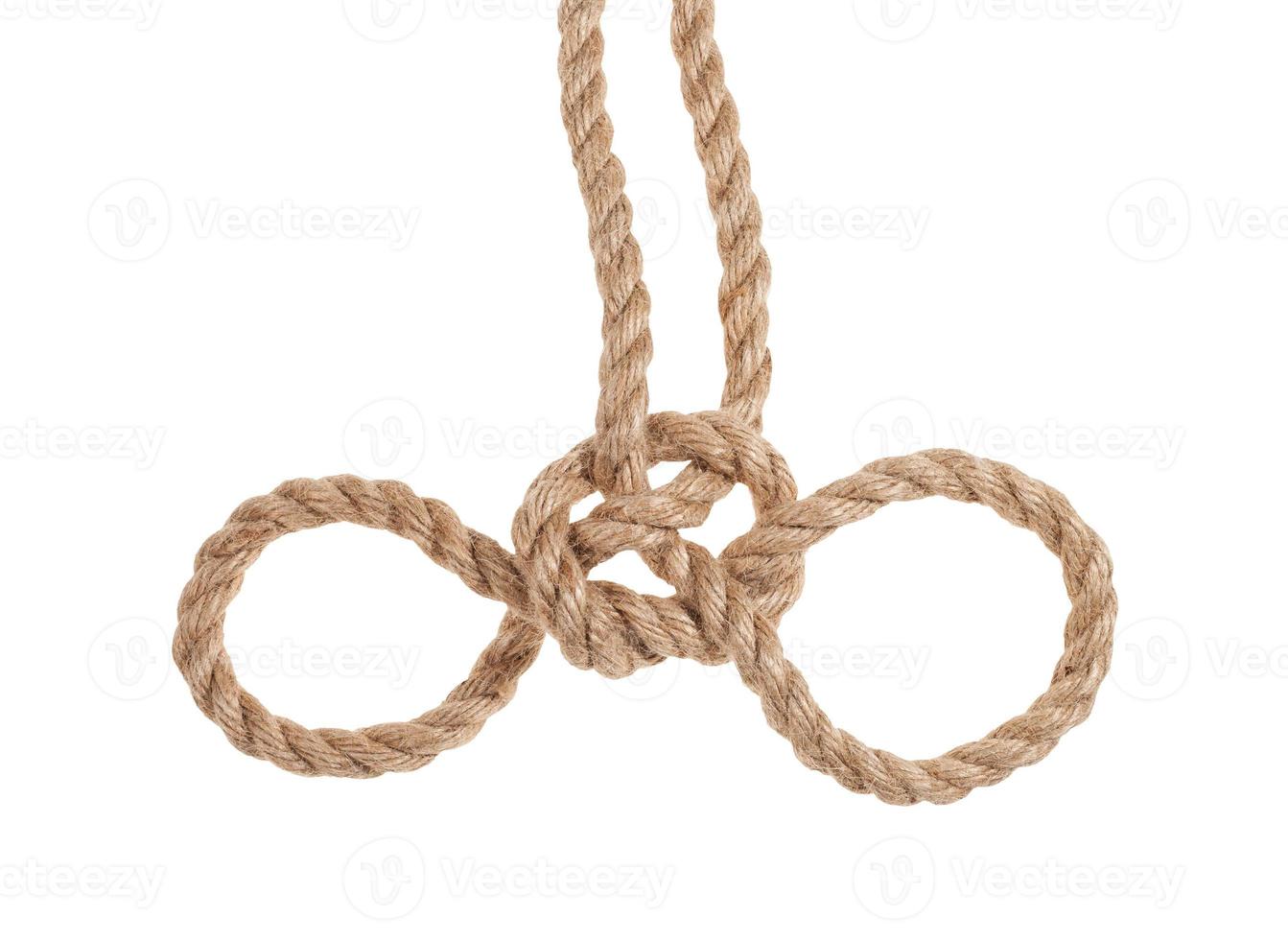un autre côté du noeud de menottes attaché sur une corde de jute photo