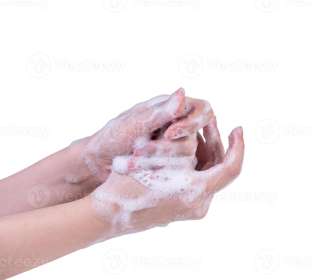 instruction d'étape de lavage des mains isolée sur fond blanc. jeune femme asiatique utilisant du savon liquide, concept de protection du coronavirus pandémique, gros plan. photo