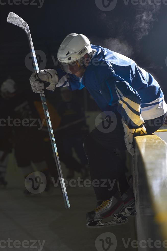 joueurs de hockey sur glace sur banc photo