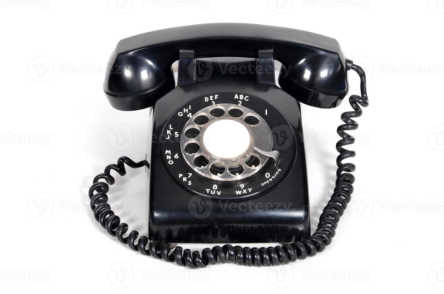 Téléphone vintage isolé sur fond blanc photo