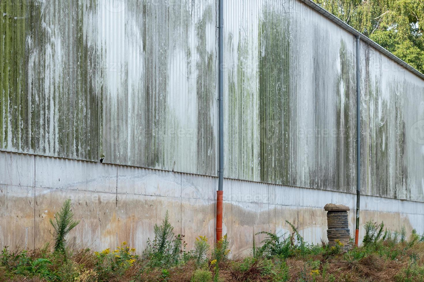 haut vieux mur de béton pourri photo