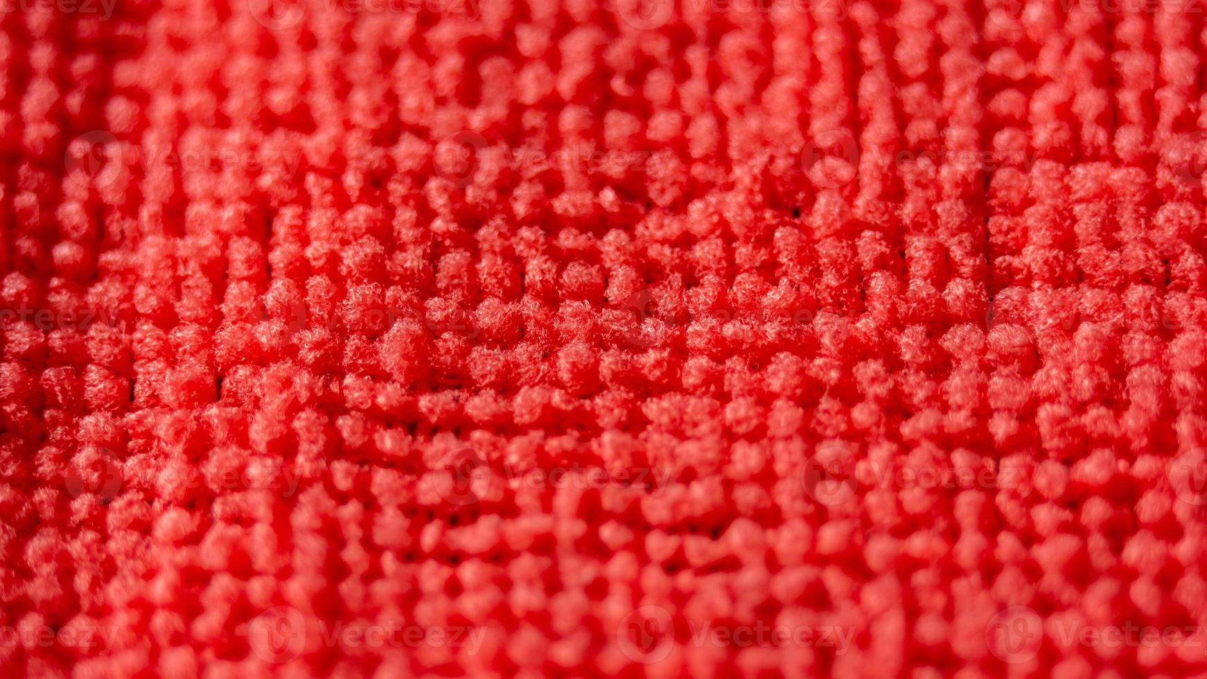 macro de chiffon de nettoyage en microfibre de couleur rouge photo