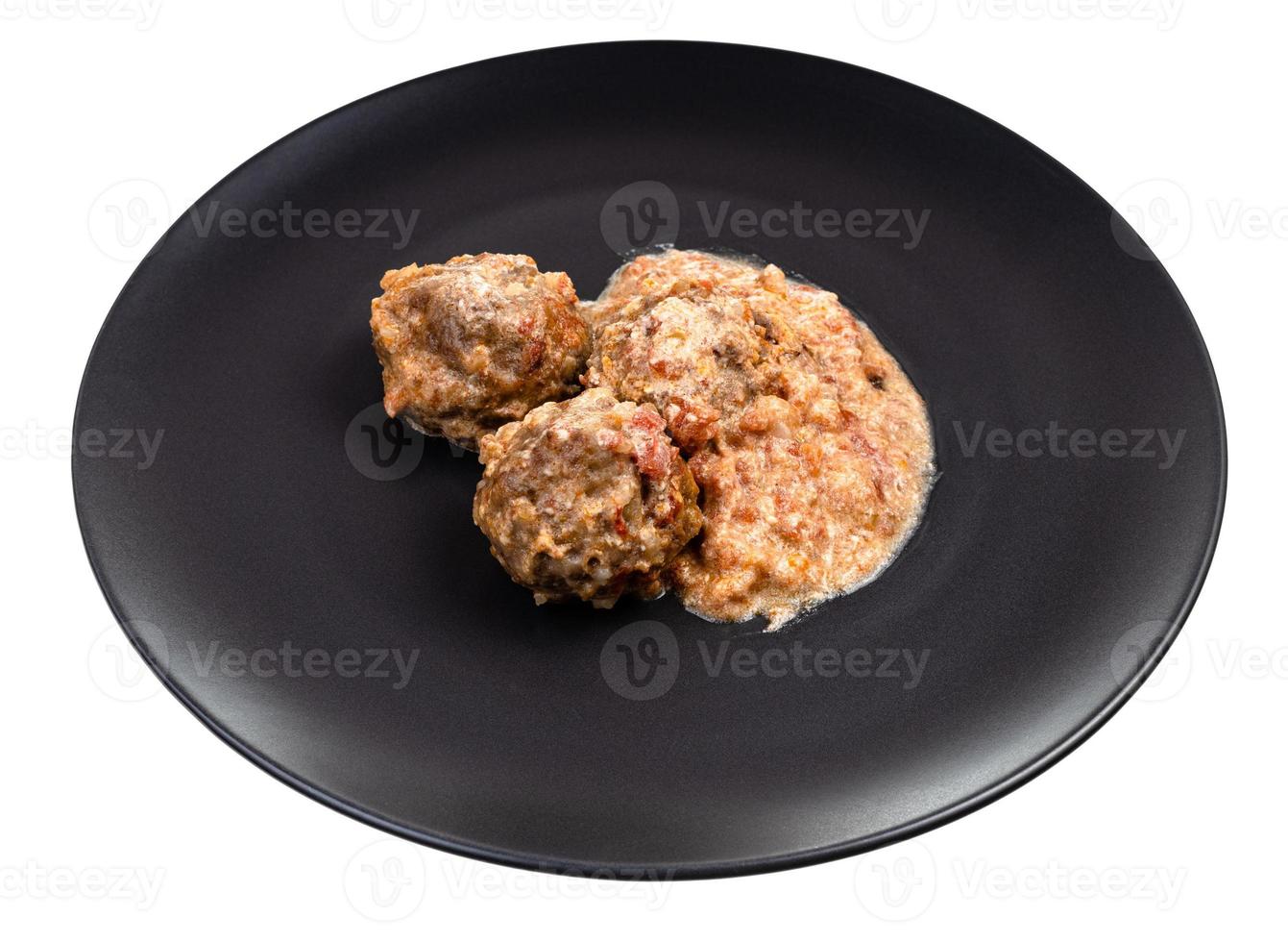 boulettes de viande cuites avec du riz sur une assiette isolée photo